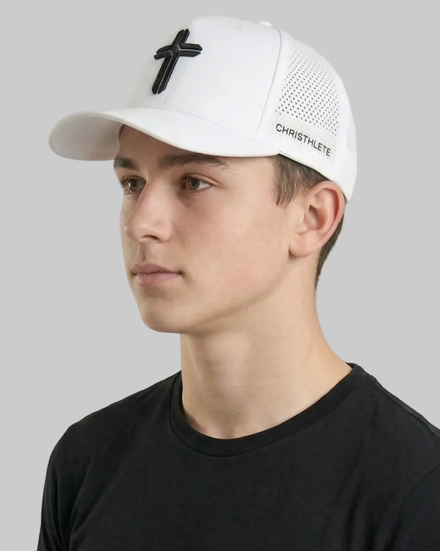 Image of Person wearing a white cap with a black cross logo and 'Christhlete' branding, against a plain background.