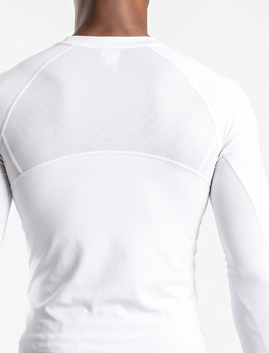 Image of White long-sleeve athletic compression shirt with a breathable mesh back panel, shown on a model from the back against a light gray background.