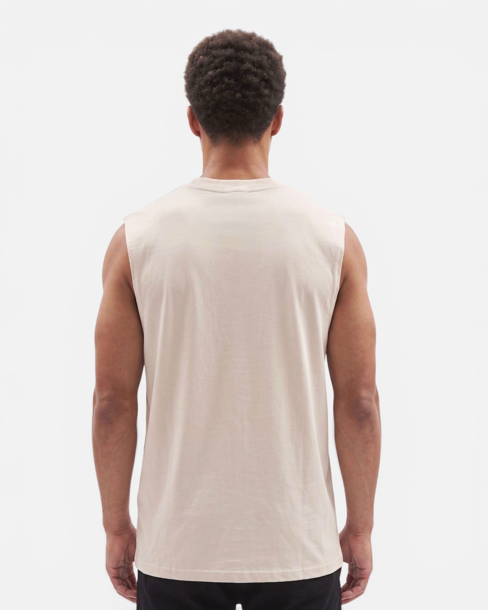 Image of Man wearing a beige sleeveless shirt on a white background